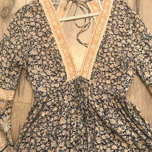 Long sleeve, backless, Free People romper.